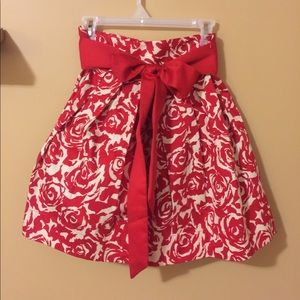 Red and white patterned skirt